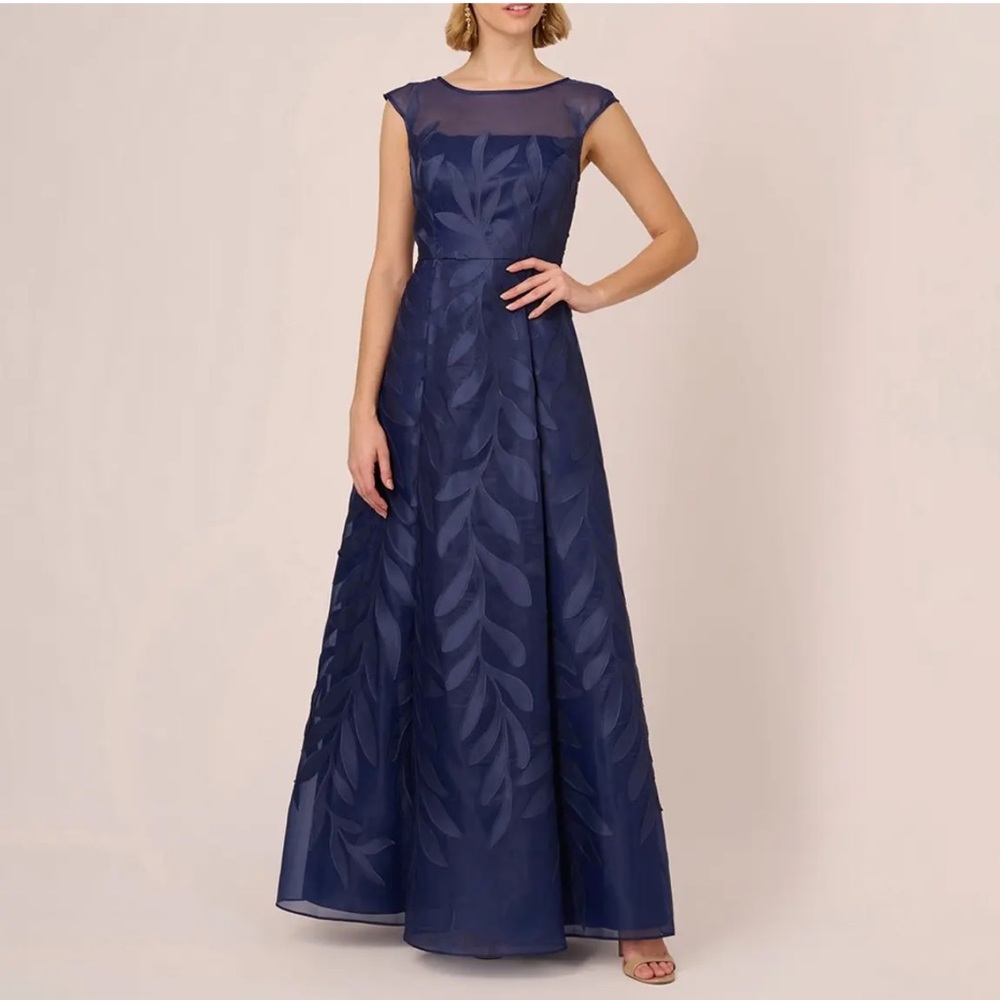Adrianna Papell
Organza Applique Boat Neck Cap Sleeve A-Line Gown